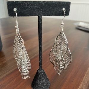 Silver toned leaf drop earrings